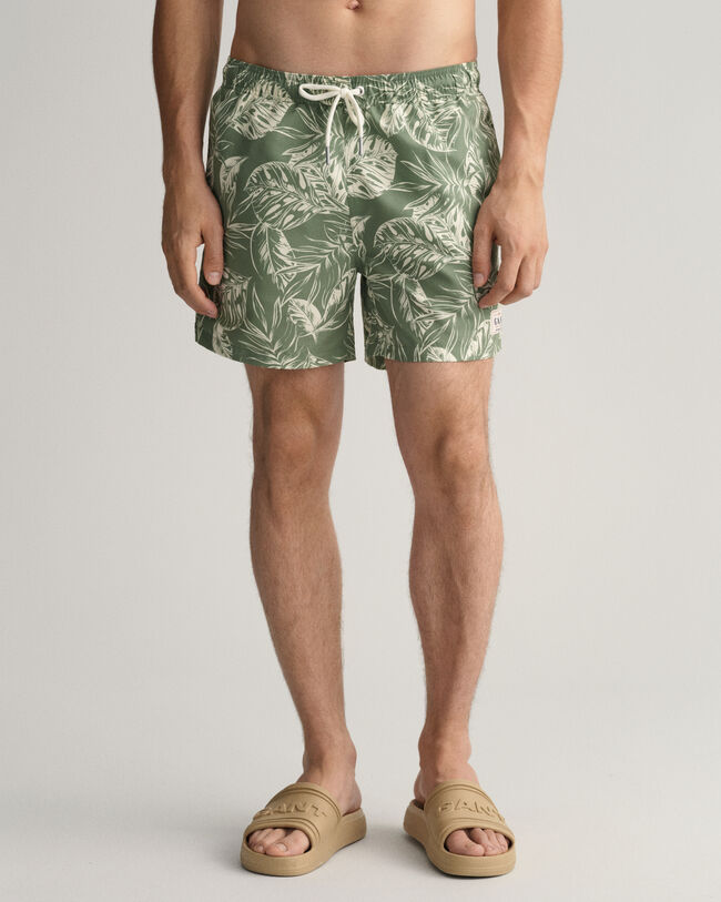 Classic Fit Tropical Leaves Badeshorts mit Print