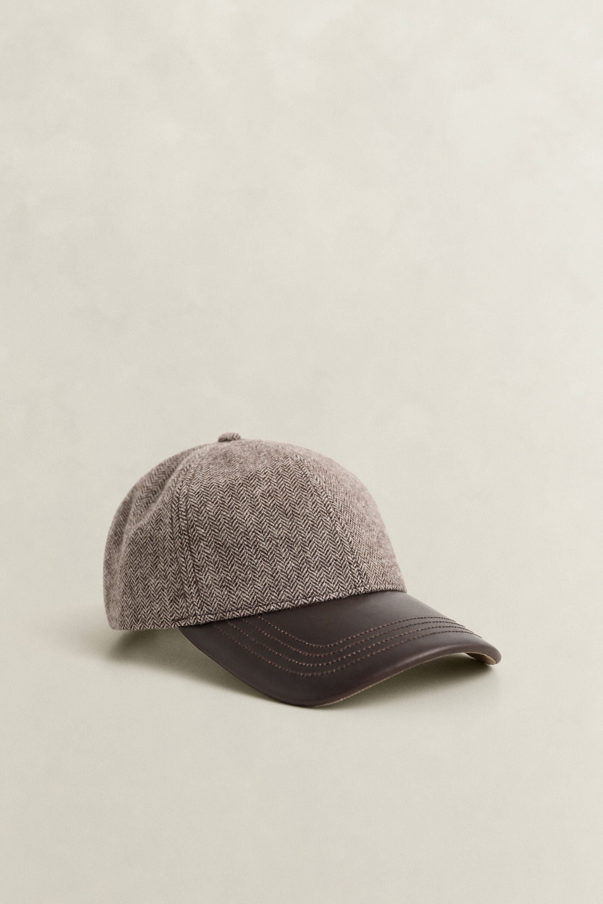 Cap aus Wollmix mit Lederschirm