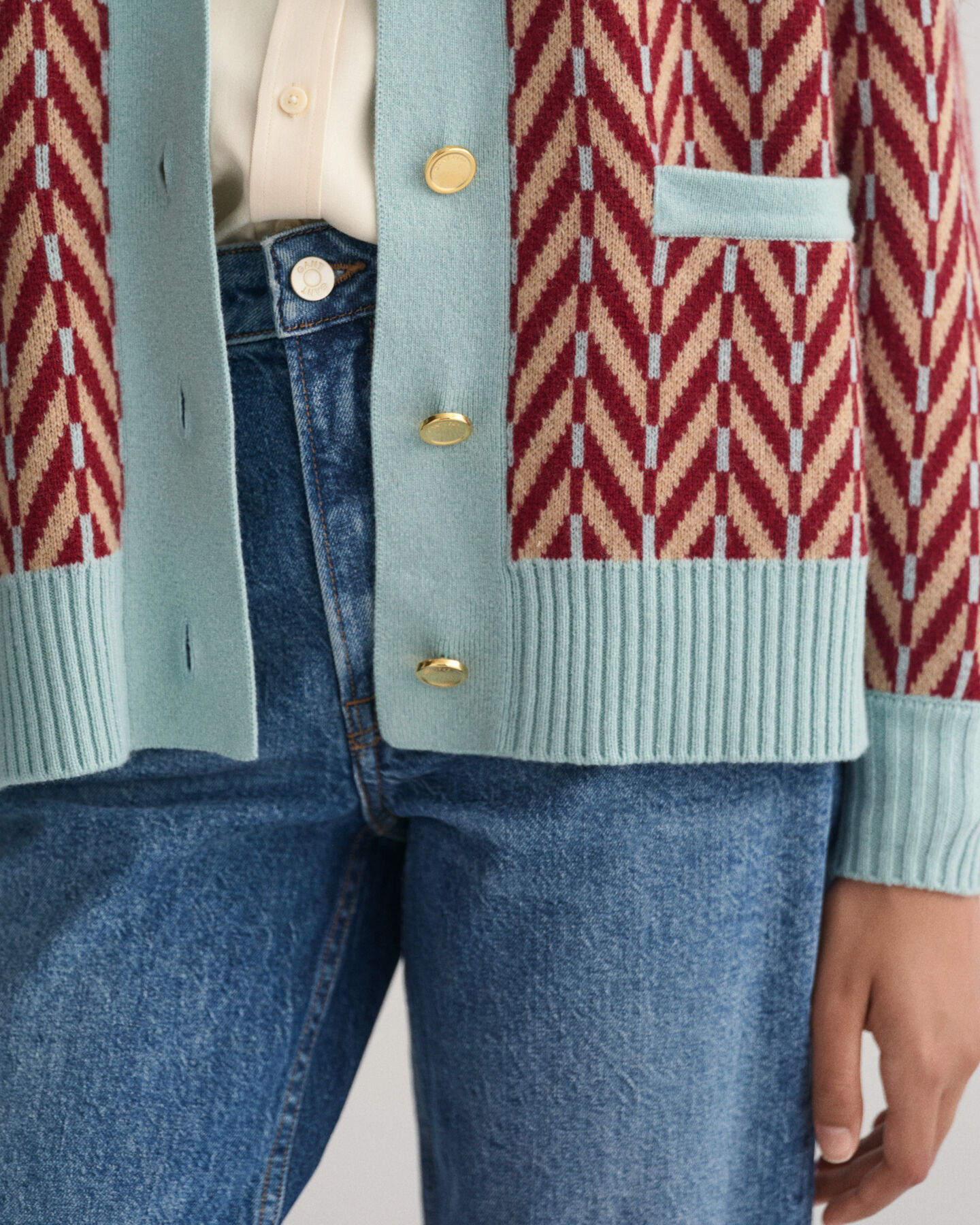 Mehrfarbige Strickjacke mit Fischgr&auml;tmuster