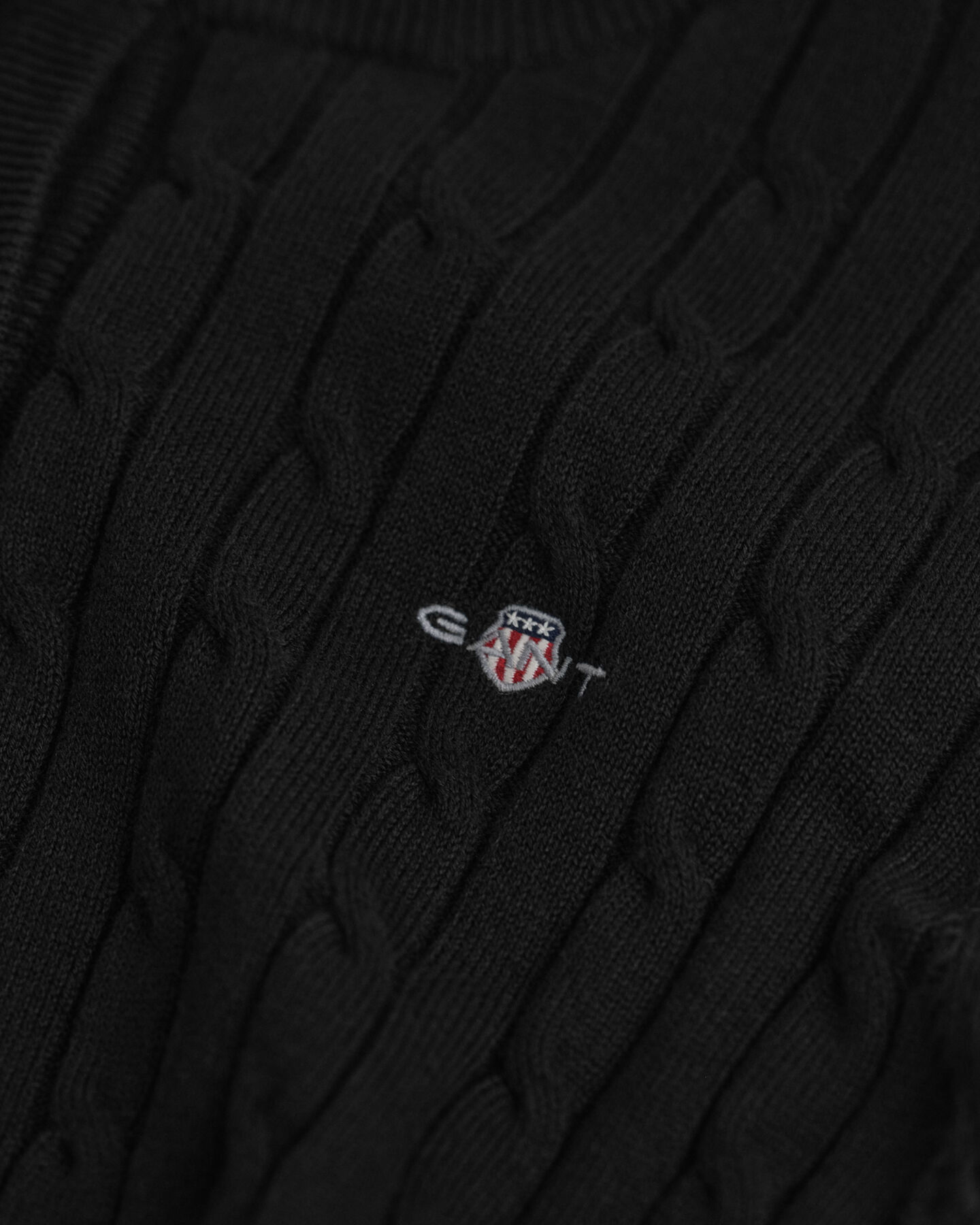 Strickjacke aus Stretch-Baumwolle mit Zopfmuster