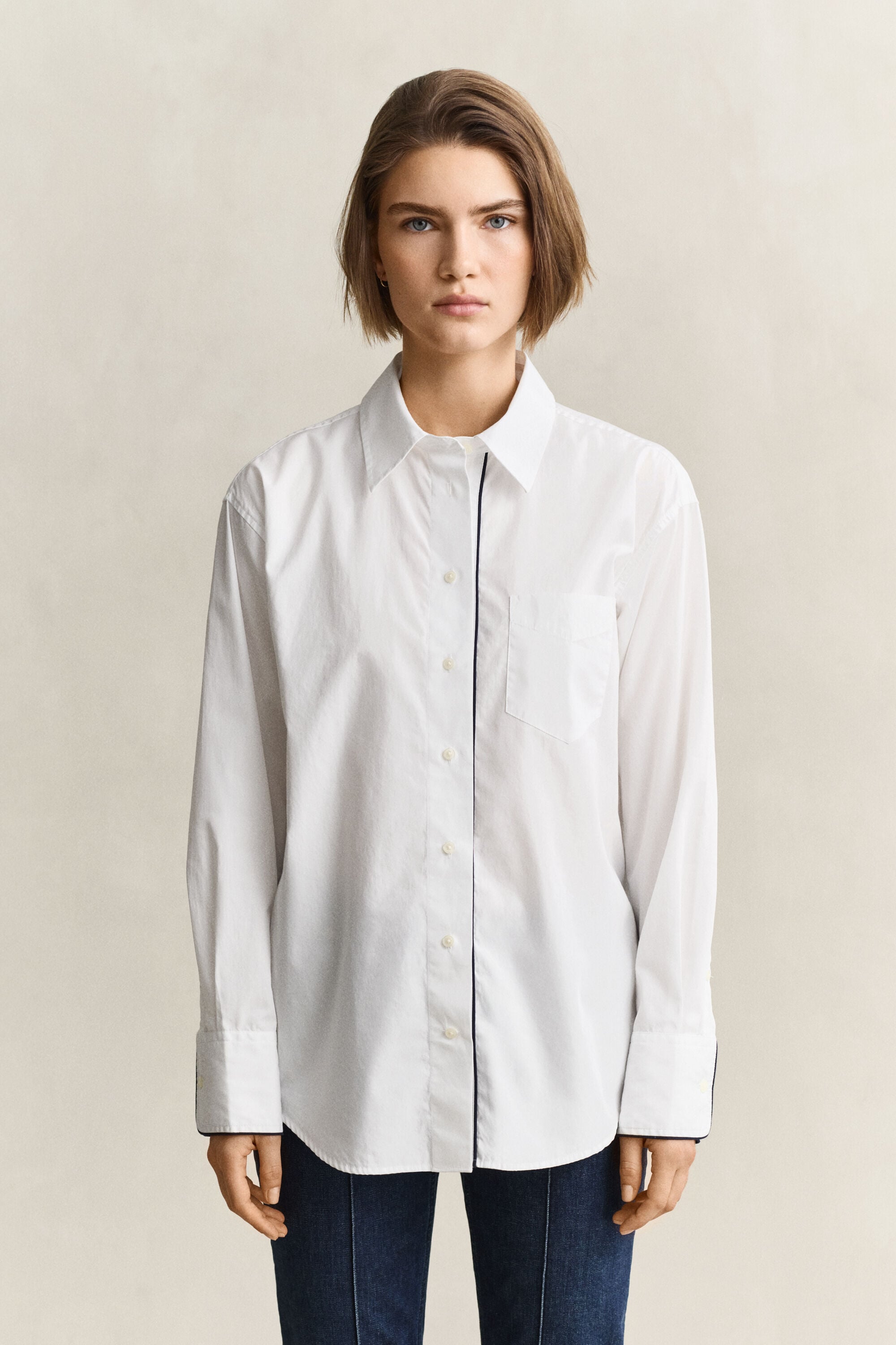 Bluse mit Paspeln