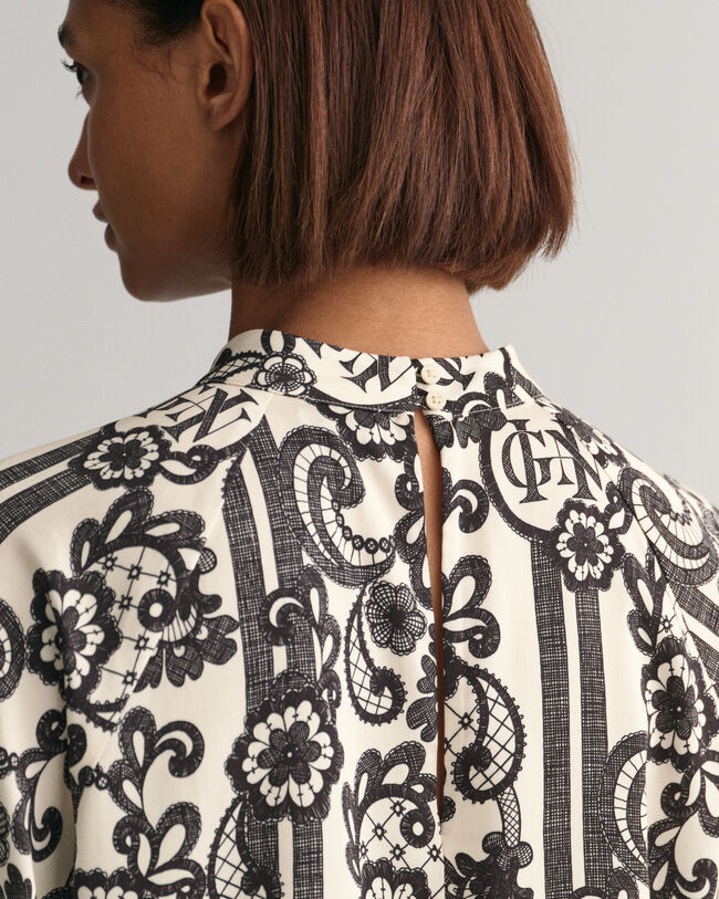 Rollkragenbluse mit Spitzen-Print