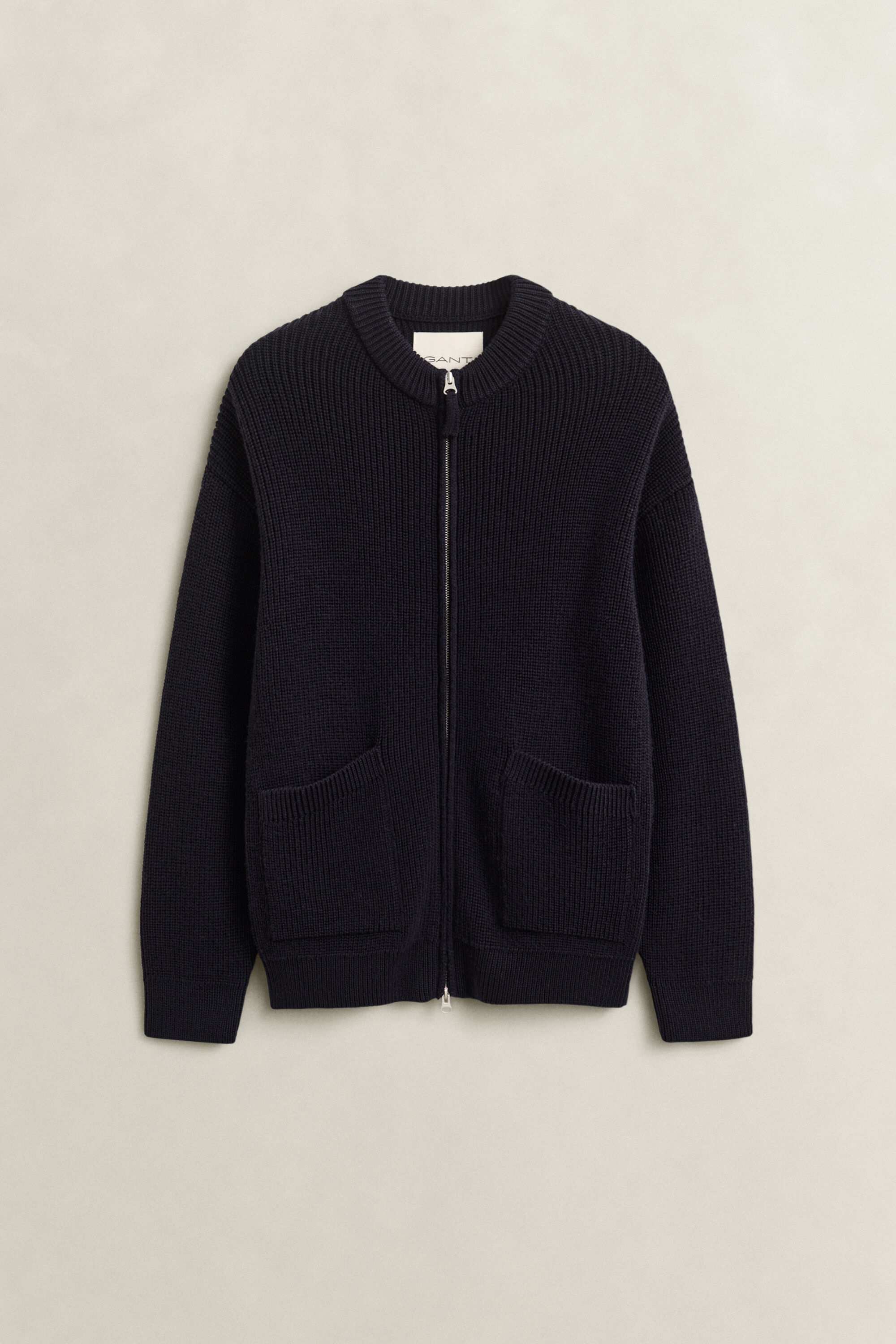Gerippte Strickjacke aus Wolle mit Reißverschluss
