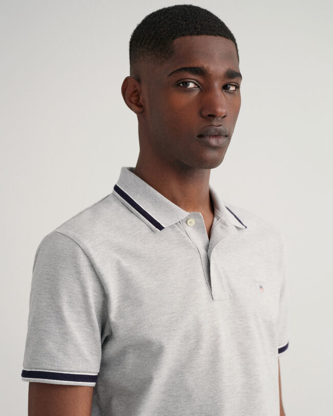 Piqu&eacute; Poloshirt mit Fischgr&auml;tmuster und Kontraststreifen