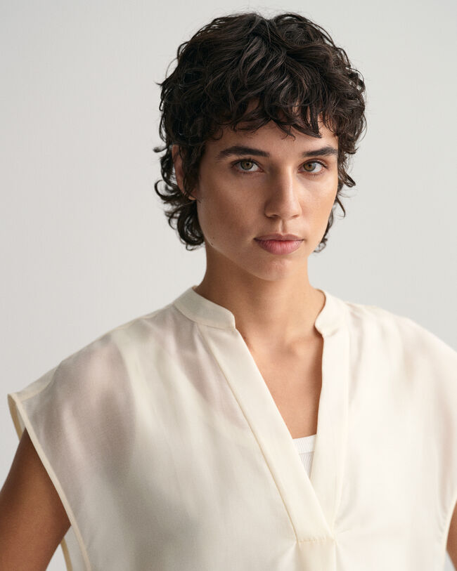 Ärmellose Stehkragenbluse