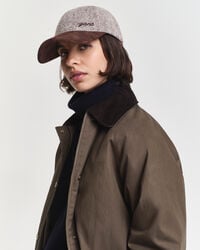 Cap aus strukturierter Wolle