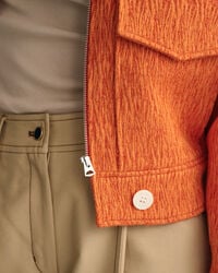 Verkürzte Bouclé Jacke