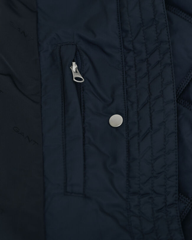 Gesteppter Mantel mit Cordbesatz