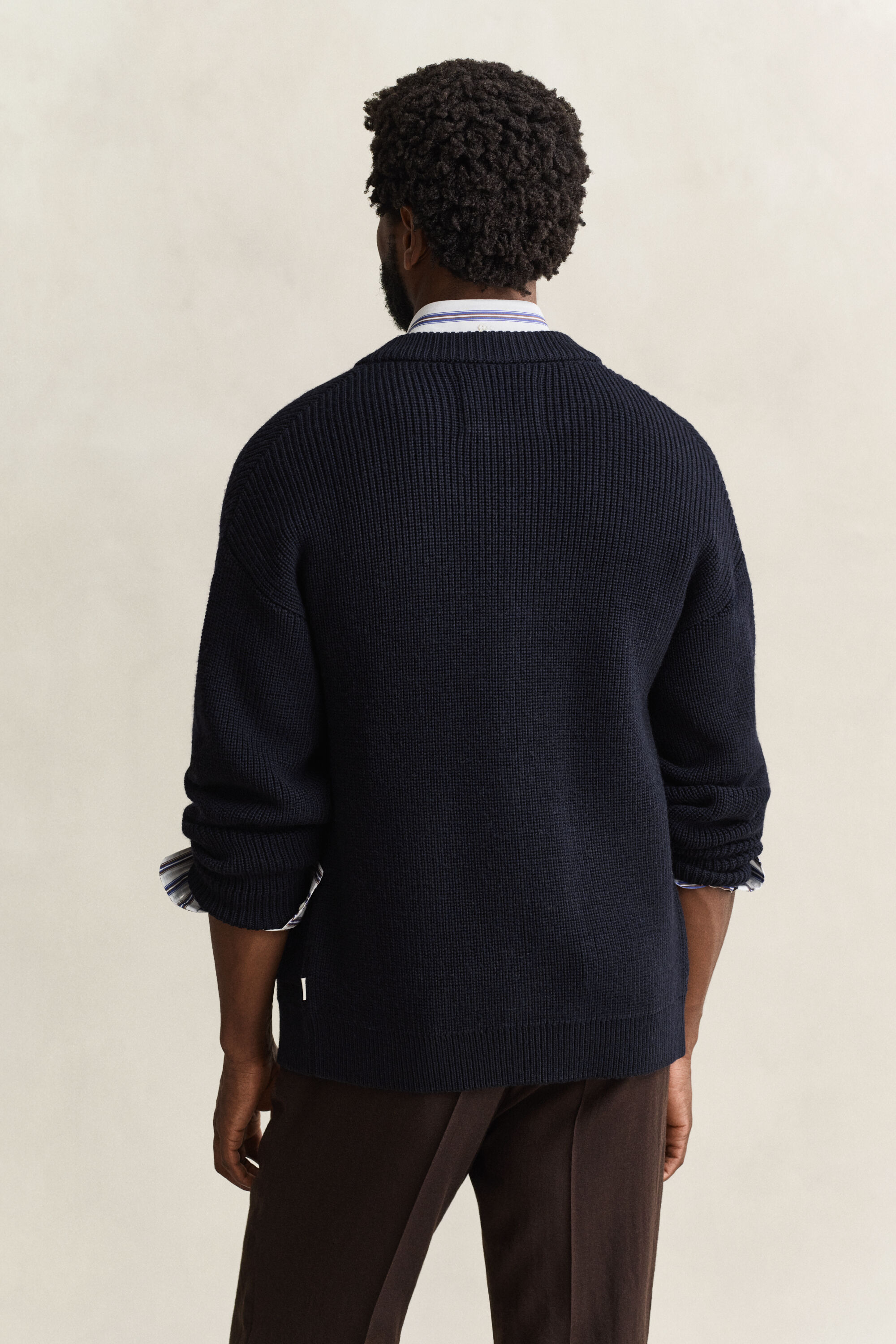 Gerippte Strickjacke aus Wolle mit Reißverschluss