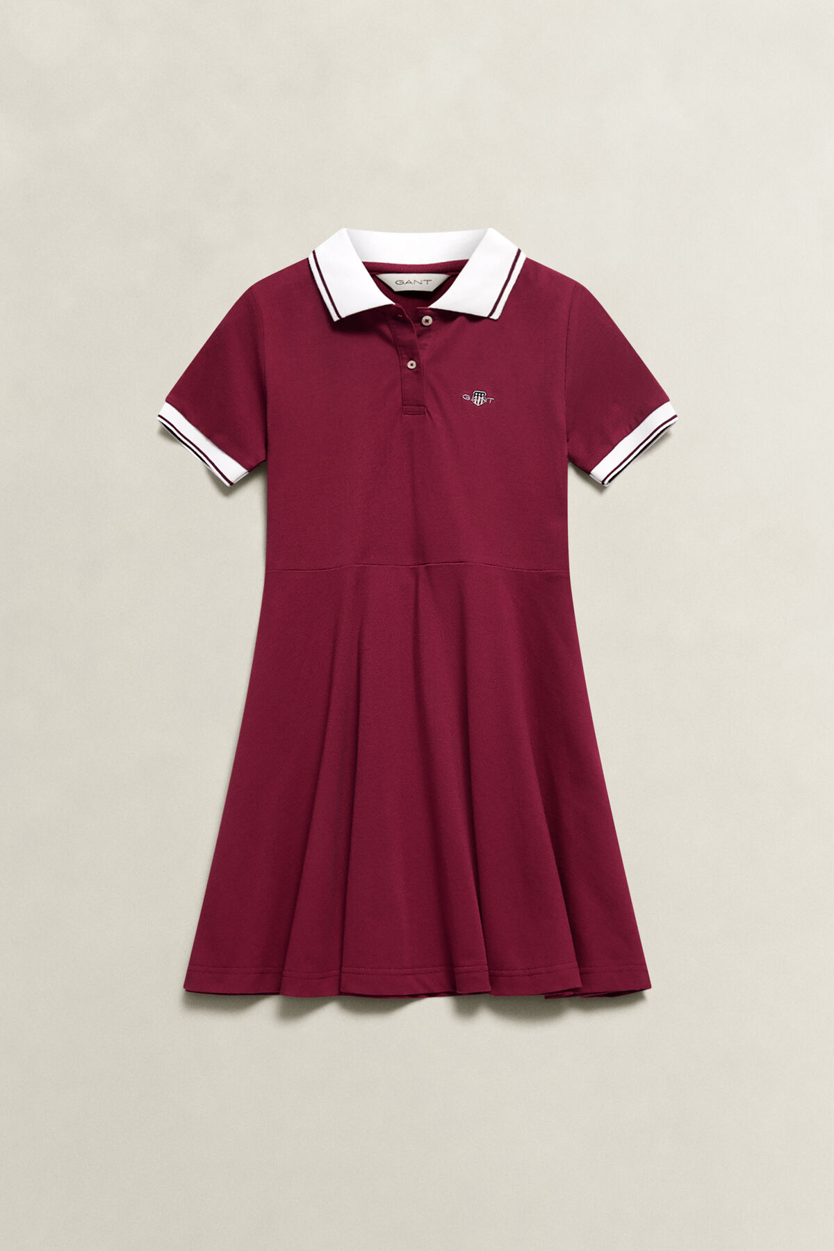 Girls Shield Polo Dress — VIBRANT BURGUNDY