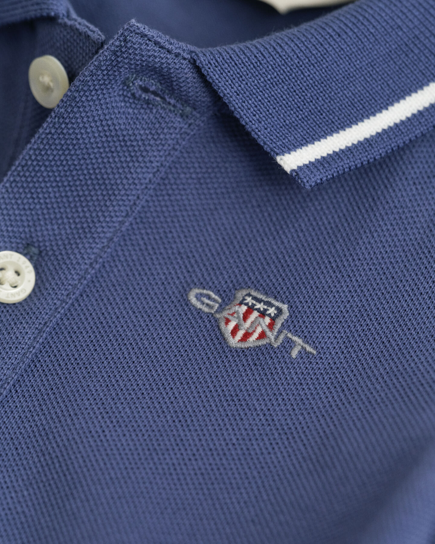 Baby Piqu&eacute; Body mit kontrastierenden Randstreifen