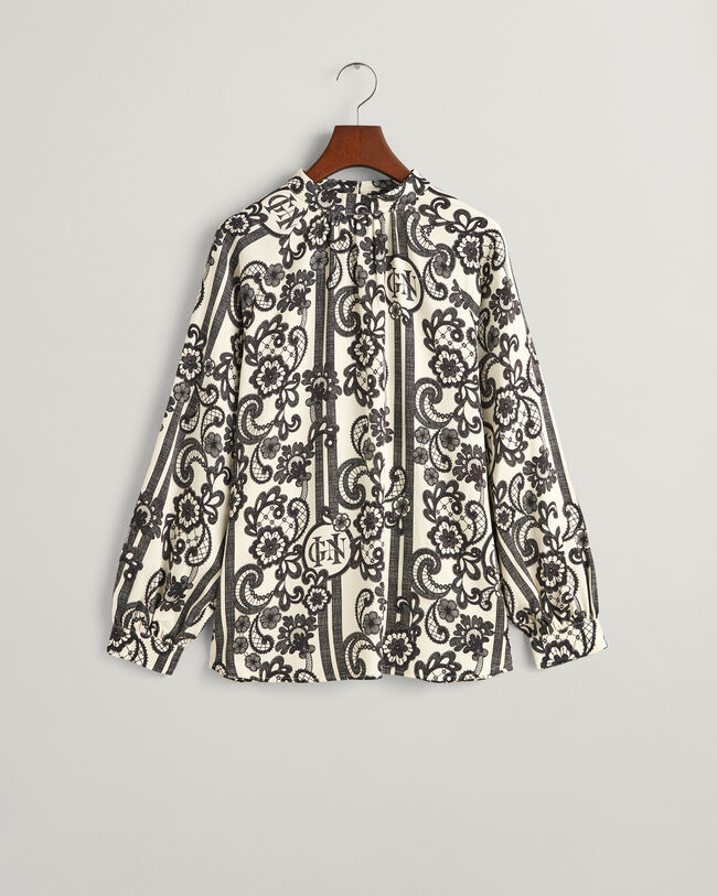 Rollkragenbluse mit Spitzen-Print