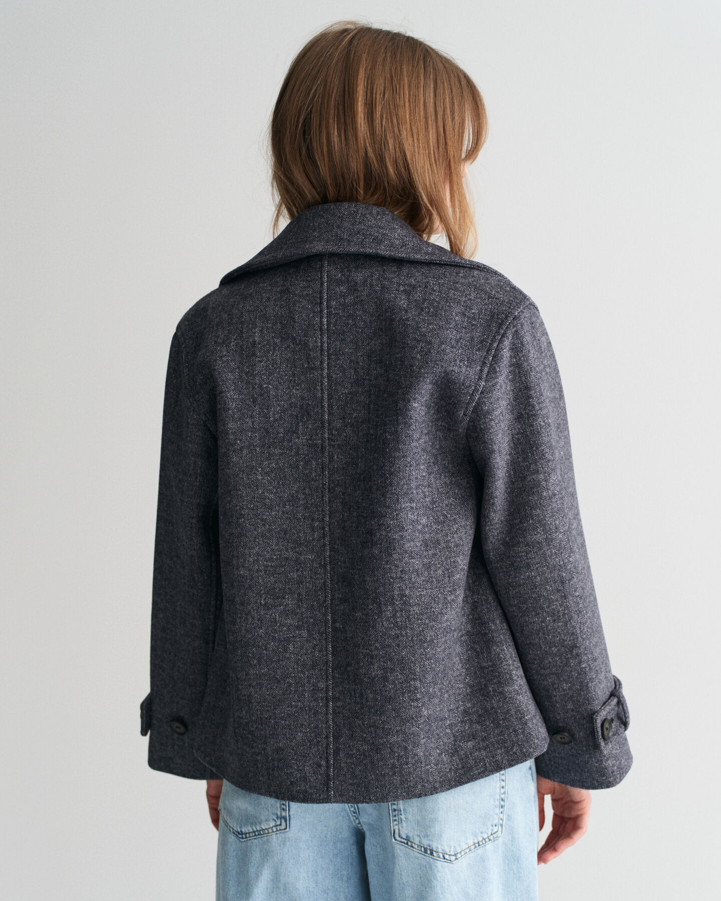Verk&uuml;rzte Herringbone Wolljacke